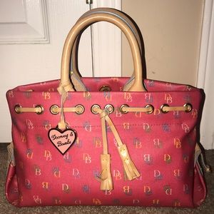 Dooney and Bourke signature pink tassel tote bag